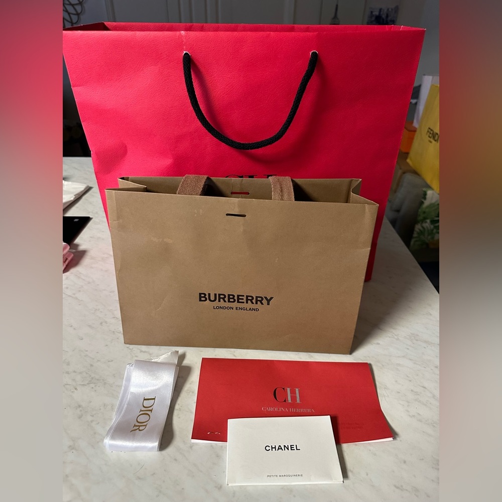 Carolina Herrera, Burberry, shopping bags,